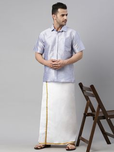 VM By VASTRAMAY Men's Lavender Solid Ethnic Shirt And Mundu Set Upgrade your ethnic wear with the VM By VASTRAMAY Men's Lavender Solid Ethnic Shirt And Mundu Set. This set combines traditional elegance with modern comfort, making it ideal for festive occasions and cultural events. Features Includes a lavender solid ethnic shirt and mundu set Perfect for traditional occasions and ceremonies Comfortable and stylish Specifications Color: Lavender Material: Cotton blend Available sizes: S, M, L, XL Material & Care Material: Cotton blend. Care: Machine washable, gentle cycle, do not bleach, tumble dry low, warm iron if needed. Legal Disclaimer: The product is guaranteed to be 100% genuine. Product images are for illustrative purposes only. Images/packaging/ labels may vary from time to time due Traditional Short Sleeve Tops For Eid, Traditional Festive Short Sleeve Shirt, Traditional Short Sleeve Festive Shirt, Traditional Cotton Shirt For Eid, Short Sleeve Traditional Wear For Eid, Traditional Short Sleeve Festive Kurta, Cultural Events, Lavender Color, Packaging Labels