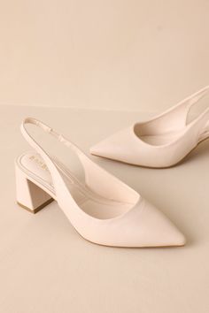 Step into style with the Lost Your Chance Ivory Pointed-Toe Slingback Heels. These stunning heels feature a classic pointed-toe design and a playful slingback strap, perfect for any occasion. You won't want to miss your chance to own these must-have heels! These Ivory heels feature a pointed toe, a faux leather material, a strap around the back of the foot, and a thick block heel. Heels measures 2" All Man Made Materials Non-skid Sole Manufactured in China Designed in the USA True to Size Wedding Shoes Block Heel, Low Heels Wedding, Stunning Heels, Ivory Heels, Gold Knot Earrings, Wedding Shoes Low Heel, Cream Heels, Closed Toe Heels, Short Heels