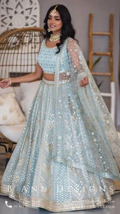 Light Blue Lehenga Simple, Blue Bohemian Anarkali Set For Wedding, Bohemian Sequined Choli For Reception, Bohemian Sequin Wedding Sets, Bohemian Wedding Sets With Sequins, Bohemian Blue Georgette Lehenga, Blue Bohemian Georgette Lehenga, Bohemian Blue Choli For Wedding, Blue Party Wear Choli With Cutdana