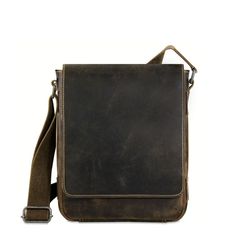 FREE GROUND SHIPPING & FREE MONOGRAMMING!BUFFALO LEATHER RUSTIC HUNTER FINISHThis casual, go-anywhere leather crossbody messenger bag is designed to fit today's active lifestyle. Handmade from buffalo leather with a hunter finish, it builds a rich patina and grows in character as it ages. The bag has vintage styling and camouflage lining with the right amount of space for your mobile devices, tablet, notepads, and charging cords. An open pocket under the flap and a zippered back compartment allo Casual Crossbody Bag, Vintage Styling, Small Messenger Bag, Charging Cord, Buffalo Leather, Crossbody Messenger Bag, E Reader, Crazy Horse, Mobile Device