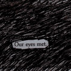 a close up of a sign on the side of a building that says our eyes met