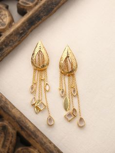 * It's dainty and can be worn every day * A special piece you'll treasure * High-quality materials and attention to detail Brass Danglers For Diwali, Gold Dual-tone Brass Earrings, Bridal Brass Earrings For Diwali, Diwali Brass Bridal Earrings, Diwali Bridal Earrings Made Of Brass, Gold Fusion Long Drop Earrings, Elegant Dual-tone Danglers For Festive Occasions, Elegant Brass Danglers For Diwali, Elegant Brass Earrings With Meenakari