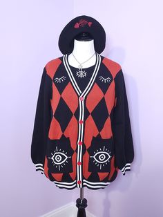 A harlequin patterned cardigan with eye detailing. Bring out your inner spooky clown. Available up to 6XL 100% cotton Scroll to last photo to see measurements Model in photos is SweetJuju on instagram Black Retro Cotton Cardigan, Clown Core Clothes, Clown Cardigan, Harlequin Outfit, Clown Aesthetic Outfit, Clown Clothing, Spooky Clothes, Clowncore Fashion, Clown Fashion