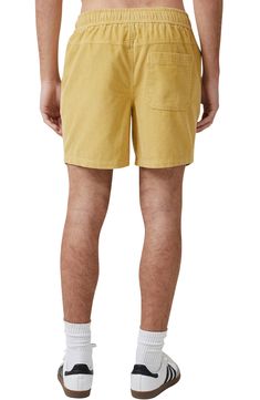 A drawstring waist and relaxed fit add easy style to these sunshine-ready cotton-blend shorts. Elastic/drawstring waist Side-seam pockets 80% cotton, 20% polyester Machine wash, line dry Imported Spring Cotton Shorts With Patch Pockets, Summer Cotton Shorts With Drawstring, Yellow Cotton Bottoms With Side Pockets, Casual Cotton Drawstring Shorts, Relaxed Cotton Shorts With Pockets, Relaxed Fit Cotton Shorts For Vacation, Yellow Cotton Summer Shorts, Yellow Summer Cotton Shorts, Relaxed Fit Cotton Shorts With Drawstring