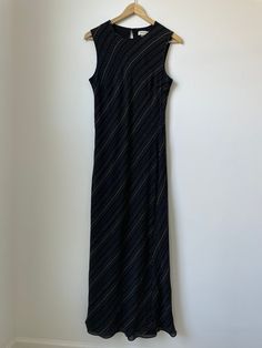 "My prices are firm, thanks for understanding!  Beautiful late 90s sleeveless dress by Ann Taylor in a unique abstract print. I would consider this maxi length, but could also be midi length depending on an individual's height. Dress is 100% silk, and is lined. No stretch. The solid black lining is slightly longer than the exterior fabric.  In good vintage condition with just light overall wear. Review photos.  Tagged a size 10, however please review measurements taken laying flat to ensure desired fit: 19.5\" pit to pit across chest (approx 21\" pulled taut)  14\" across straps/arm openings  17\" approx across waist  21\" approx across hips (this is just an estimate of where it may land on the hips, I measured 26\" above bottom hem, however this can vary due to individual proportions) 52\ 90s Dress Outfit, Black Dress Y2k, Cut Black Dress, Hand Inspiration, Maxi Dress 90s, 90s Maxi Dress, Fall Thrift, Thrift Wishlist, Closet Edit