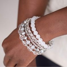 Infused With Silver Accents, A Glassy Collection Of White And Metallic Crystal-Like Beads Are Threaded Along Stretchy Bands Around The Wrist For A Whimsically Layered Look. Sold As One Set Of Six Bracelets. Bracelets Set, Jewelry Crystal, Stretchy Bracelets, Paparazzi Jewelry, Silver Accents, One Set, White Beads, Layered Look, Womens Jewelry Bracelets