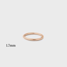 A classic band that goes perfectly with any engagement ring and is a great addition to any stack! 14k Rose Gold Stackable Rings, Classic Stackable Rings For Round Band, Classic Stackable Rings With Simple Round Cut, Classic 14k White Gold Midi Rings, White Gold 14k Classic Midi Rings, Classic Rose Gold Midi Rings For Anniversary, Classic Everyday Stackable Rings With Round Cut, Classic Everyday Stackable Rings With Smooth Bezel, Classic 14k Gold Solitaire Midi Rings