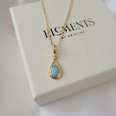 Blue opal pendant necklace. Wear it on it's own or layer it.Pendant details:* Finish: non tarnish gold filled, opal stone* Measurements: 0.4' inch W 1' inch HChain: non tarnish gold filled Comes in our gift ready packaging: soft velvet pouch for safe jewelry storing and branded box Blue Opal Necklace, Opal Pendant Necklace, Figaro Chains, Figaro Chain, Necklace Box, Velvet Pouch, Tampa Fl, Opal Stone, Opal Pendants