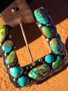 One of my favorite things to design, sterling silver and American turquoise "Ranger" buckles are inspired, artful creations. They look amazing with our vintage latigo belts or Wild West turquoise concho belts. This set is unique that it has a top, keeper, and A beautiful combination including natural Piolet Mountain and Royston turquoise. Our On the Range finish 3.5 to 4 inch size range. Please contact me for availability and pricing. I do my best to keep these in production, but often times hav Southwestern Turquoise Concho Belt Buckles, Western Turquoise Belt With Concho, Turquoise Western Belt With Concho, Vintage Turquoise Belt With Concho, Southwestern Turquoise Jewelry With Antique Buckle, Vintage Adjustable Turquoise Belt, Adjustable Turquoise Vintage Belt, Adjustable Vintage Turquoise Belt, Turquoise Bohemian Belt With Concho