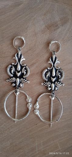 Discover the beauty of traditional Berber craftsmanship with this exquisite pair of silver Moroccan fibulas. These unique tribal pieces, intricately designed and symbolic of protection, are both functional and decorative. Handcrafted by Berber artisans, this fibula pair reflects the rich cultural heritage of North Africa and adds a bold, authentic touch to any jewelry collection. Wedding Gift Baskets, Cultural Heritage, North Africa, Morocco, Halloween Shopping, Favorite Jewelry, Brooches, Wedding Gifts, Jewelry Collection