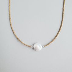 TORI coin pearl seed bead necklace Minimalist Beaded Necklace With Pearl Drop, Dainty Pearl White Beaded Necklaces With Pearl Pendant, Minimalist Pearl White Pearl Necklace With Tiny Beads, Minimalist Pearl White Necklace With Tiny Beads, Pearl White Beaded Necklaces With Pearl Charm, Pearl White Beaded Necklace With Pearl Charm, Minimalist Pearl Necklace With Tiny Beads, Dainty Beaded Necklaces With Pearl Pendant, Pearl White Necklace With Tiny Beads