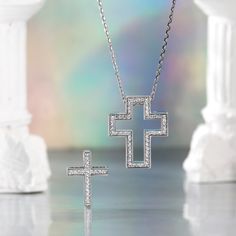 A deep and devoted connection to faith is something to honor. Express loyalty with a magnificent cross pendant. The unique design of the iconic cross is especially captivating. The jewel has two crosses one inside the other, joined by a silver chain. Crafted in sterling silver, each traditional cross is outlined with a glittering array of shimmering stones, while the edges are a sophisticated touch. Modern cross pendants that can be combined into one breathtaking cross pendant. Can be worn 3 dif Luxury Sterling Silver Cross Necklace, Luxury Cross Necklace For Anniversary, The Jewel, Modern Cross, Sterling Silver Necklace, Cross Pendant, Sterling Silver Necklaces, Silver Chain, Unique Design