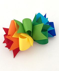 a multicolored bow on a white background