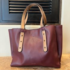 -New Without Tags -Burgundy Color -Triple Compartment -Vegan Leather -Measurements: -Length: 17” -Width: Approximately 7-8” -Height: 10” Burgundy Tote Bags For On-the-go, Burgundy Satchel Shoulder Bag For On-the-go, Burgundy Bags With Detachable Handle For Shopping, Burgundy Shoulder Bag With Large Capacity And Double Handle, Large Capacity Burgundy Satchel, Burgundy Satchel With Handles For Shopping, Burgundy Bag With Detachable Handle For Everyday, Burgundy Double Handle Satchel With Large Capacity, Burgundy Shoulder Bag With Detachable Double Handle