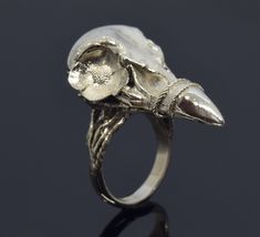 Raven Norse Ring, Crow Bird Skull Ring, Raven Jewelry. ArmenianJewelryHouse personnel do everything to complete the customer's safety and experience.  Item Details  - Material: 925 Sterling Silver - Weight ~ 17.00 Grams(Depending on size) - Head dimensions:       Length: 34 millimeters,       Width: 17 millimeters,       Height: 15 millimeters - Gender: Male / Female - Finish: Polished Silver - The product is handmade and its weight may vary up to 1.00 grams. - We recommend using the main photo