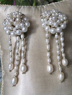 Pearl Dangly Earrings These lovely clip on vintage earrings ooze femininity and would complement any outfit.  The irregular dangles are genuine lustrous water pearls strung with tiny silver beads in between. So chic. The pearls on the clip are faux pearls. Excellent condition Silver Strand, Glass Drop Earrings, Water Pearls, Dangly Earrings, Enamel Earrings, Antique Earrings, Lovely Earrings, Glass Earrings, Blue Earrings