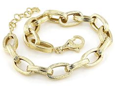 Step into elegance with the Artisan Collection of Turkey™'s Oval Link Bracelet! This stunning piece features a delicate design crafted from 18K Gold Over Sterling Silver. The playful oval links create a unique and eye-catching look that will elevate any outfit. Measuring at 7 inches in length x 0.29 inches in width, this bracelet is perfect for adding a touch of glamour to your everyday style or dressing up for special occasions. With its high-quality materials and exquisite finishing technique, Gold Plated Oval Bracelet, Elegant Oval Bracelets With Solid Link Construction, Elegant Oval Chain Bracelet For Formal Occasions, Gold Oval Metal Chain Bracelet, Oval Gold Metal Chain Bracelet, Formal Gold Bracelet With Adjustable Oval Link Chain, Elegant Gold Bracelet With Adjustable Oval Chain, Elegant Gold Oval Bracelet With Adjustable Chain, Elegant Oval Metal Bracelets