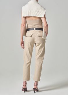 An off-duty essential. The Leah cargo is designed with a utility inspired detail, a relaxed fit at the ankle, and a tapered inseam. This fit is true to size. Looks Like: Classic khaki brownFeels Like: Midweight yet breathable rigid twill with a soft hand that gives a vintage feel Closure: Button FlyRise: 10 7/8"Inseam: 26"Leg Opening: 12 1/4"Model is 5'10" and is wearing a Size 27Fabric: 100% Regenerative CottonCare Instructions: Machine wash cold inside out with like colors. Do not bleach. Tumble dry low. Pants Low Waist, Turkey Style, Cami Nyc, Cashmere Accessories, Sun With Sunglasses, Cashmere Turtleneck, Taos, Short Mini Dress, Cashmere Cardigan