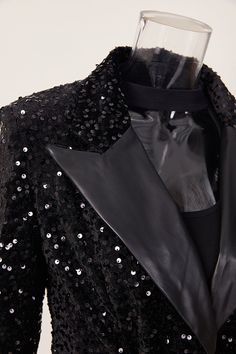 Expertly crafted with a PU Leather lapel and sequin embellishments, our Midnight Dream blazer exudes sophistication and style. The included up leather belt adds a touch of elegance, making this blazer perfect for any special occasion. Elevate your wardrobe with this must-have statement piece. Decoration Sequined Style Elegant Fabric Type Blended fabrics , Sequin , PU Material Polyester , Polyester Neckline Suit Collar Pattern Type Solid , Patchwork Sleeve Length Full Season Spring / Autumn , Winter Fabric Slight Stretch Suit Collar Pattern, Black Jumpsuit Dress, Patchwork Sleeve, Suit Collar, Sequin Blazer, Curvy Lingerie, Elegant Fabric, Winter Fabric, Curvy Dress