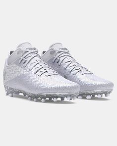 the nike vapor soccer shoe is white and silver