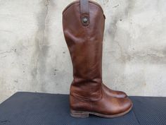 FRYE Melissa Tab Tall Brown Leather Riding Boots Women's Size 6 B Awesome shoes minor scuffs, check photos for clear visual description. PLEASE VIEW ALL PHOTOS CAREFULLY AS I CONSIDER THEM PART OF THE DESCRIPTION. I WILL GLADLY COMBINE SHIPPING FOR MULTIPLE ITEMS PURCHASED IF THEY CAN BE SAFELY SHIPPED TOGETHER. DELIVERY WITHIN 5 BUSINESS DAYS, 1-2 DAYS HANDLING ONCE YOUR PAYMENT CLEARS, THIS ITEM WILL COME PROFESSIONALLY PACKAGED AND SHIPPED WITH CARE. PLEASE CONTACT ME THROUGH MESSAGES IF YOU HAVE ANY QUESTIONS OR CONCERNS. THANKS FOR LOOKING Brown Leather Riding Boots, Awesome Shoes, Womens Riding Boots, Leather Riding Boots, Boot Shoes Women, Nice Shoes, Kenya, Riding Boots, Brown Leather