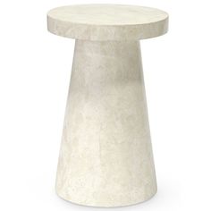 a small white table with a round top on a white background for use as an accent piece