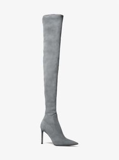 Reach new heights with our Elle boots as seen on the Fall/Winter 2022 runway. Finely crafted in Italy from rich suede this statement-making pair is designed in an over-the-knee silhouette and set on a stiletto heel to create the illusion of longer legs. Style them with dresses and jeans alike. Luxury Suede Knee-high Heeled Boots, Luxury Over-the-knee Winter Boots, Designer Fitted Suede Heeled Boots, Elegant Suede Platform Boots, Luxury Suede Knee-high Boots For Evening, 2022 Runway, Longer Legs, Michael Kors Collection, Winter 2022