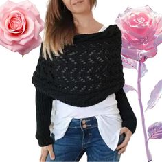 a woman is wearing a black sweater and has pink roses in front of her face