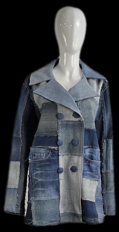 a white mannequin head wearing a jacket made out of blue and grey jeans