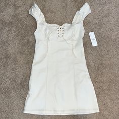 Urban Outfitters Dress Cream With Brown Stitching Brand New With Tags Size Small Comment If You Have Any Questions! Bundle & Save Make Offers Beige Cotton Mini Dress With Lace Trim, Fitted Off White Mini Dress With Lace Trim, Urban Outfitters White Mini Dress For Day Out, Cream Cotton Mini Dress, Fitted Cream Mini Dress With Lace Trim, White Ruffled Mini Dress From Urban Outfitters, Off-white Cotton Mini Dress For Spring, Cream Fitted Mini Dress For Spring, Off White Fitted Casual Dress