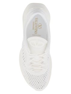 Step out in style with these lightweight and chic sneakers, perfect for any fashion-forward individual. The rubberized Vlogo detail and tonal leather accents add a touch of luxury to this ultra-modern design. With a lace-up closure and ultra-light rubber sole, these sneakers are as comfortable as they are stylish. White lightweight technical mesh Rubberized Vlogo signature detail on tongue Lace-up closure Ultra-light rubber sole | Valentino Garavani Women's True Actress Sneakers in White | Size Trainers For Women, Valentino Sneakers, Women Crafts, Chic Sneakers, Luxe Interiors, Iconic Fashion, Leather Cap, White Mesh, Pumps Flat