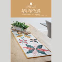 a table runner with a potted plant on it and the title, star dancer table runner