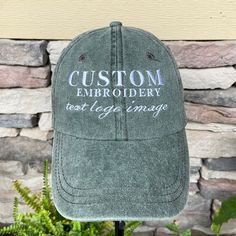 CUSTOM EMBROIDERED CAPS with personalized text, logo or graphic image! What a perfect opportunity it is to creatively embroider your custom text, company logo, or image onto a baseball cap! We have a variety of options for you to customize your hat exactly the way you envision it, and offer a growing collection of cap colors, thread, and font options.  Choose from the following:  1) Custom text on front $26.95 2) Custom text on front and back $34.49 3) Custom text on back only $24.95 4) Custom i Customizable Cotton Trucker Hat With Curved Bill, Custom Cotton Hat With Curved Bill, Customizable Cotton Trucker Hat One Size, Customizable Cotton Trucker Hat, Customizable Cotton Hat With Curved Bill, Customizable Cotton Baseball Cap With Curved Bill, Customizable Curved Bill Cotton Baseball Cap, Customizable Green Baseball Cap, Custom Baseball Cap