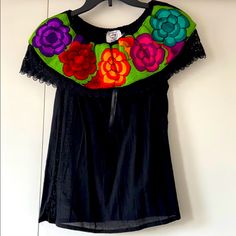 Mexican Floral Embroidered Off The Shoulder Top; Never Worn Traditional Black Embroidered Top For Spring, Black Embroidered Top For Summer Festival, Black Embroidered Top With Neckline Detail For Summer, Folk Style Black Blouse For Summer, Black Embroidered Neckline Top For Summer, Black Short Sleeve Top For Fiesta, Fitted Black Embroidered Top For Festival, Traditional Black Tops For Spring, Folk Style Black Embroidered Top For Festival