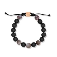 This stylish bracelet is hand strung with Botswana agate, matte black agate, black lava stone, and brown moonstone beads that range in size from 10-12mm. The 14 karat rose gold push down clasp is engraved with the Stephen Silver Fine Jewelry logo and makes the bracelet adjustable in size. Reference Code: 33455 Shop other beautiful pieces in our Bracelet Collection. For inquiries on the piece please contact boutique@shsilver.com Elegant Black Lava Stone Beaded Bracelets, Elegant Adjustable Lava Stone Jewelry, Elegant Lava Stone Bracelets With Round Beads, Elegant Lava Stone Beaded Bracelets, Elegant Lava Stone Bracelet With Round Beads, Stephen Silver, Jewelry Logo, Botswana Agate, Stylish Bracelet