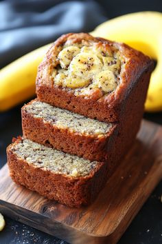 Banana bread topped with banana slices, partially cut on a wooden board. Gluten Free Banana Bread Recipe Moist, Overripe Banana Recipes Gluten Free, Healthy Banana Bread Gluten Free, Banana Recipes Protein, Gluten Free Banana Recipes, Healthy Gluten Free Banana Bread, Banana Bread Recipe Gluten Free, Gluten Free Banana Nut Bread, Best Gluten Free Banana Bread