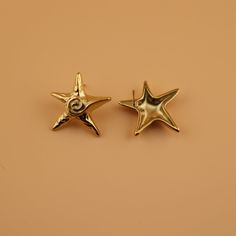 Make a splash with The Camilla Earrings. This set features a starfish design perfect for adding a fun and beachy vibe to any look. Dare to take a dip in our new stainless steel, tarnish & fade-free jewel collection. Metal Starfish Jewelry, Gold Star Earrings For Summer, Summer Star-shaped Jewelry For Pierced Ears, Metal Starfish Charm Jewelry, Nickel-free Starfish Earrings Ocean-inspired, Gold Starfish Earrings Nickel Free, Gold Nickel-free Starfish Earrings, Nickel-free Gold Starfish Earrings, Silver Star Earrings For Summer