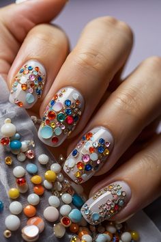 Bring a touch of sparkle and shine into your world with these dazzling rhinestone nail designs that are as easy to create as they are beautiful. Whether you're a beginner or a seasoned nail artist, these ideas will inspire you to create magic on your fingertips. Click now for more inspiration and follow us for daily dose of nail art creativity! #NailAddict #RhinestoneMagic