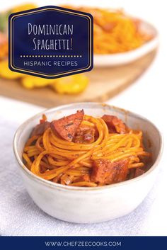 two bowls filled with spaghetti on top of a table