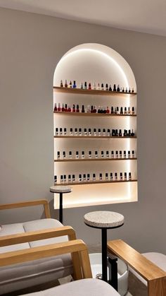 a room filled with furniture and lots of bottles