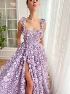 Lavender Petal Princess Gown | Teuta Matoshi Lavender Fitted Bodice Dress For Prom, Lavender Ball Gown For Prom, Lavender Ball Gown For Prom Season, Lace Evening Dress With Floral Applique For Gala, Gala Lace Evening Dress With Floral Applique, Gala Evening Dress With Floral Applique Lace, Purple Floor-length Gown With Floral Embroidery, Spring Gala Gown With Lace Bodice, Lavender Evening Dress For Gala And Prom Season