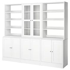 a white bookcase with doors and drawers