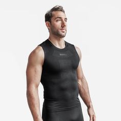 MEN'S MIDWEIGHT SEAMLESS COMPRESSION SLEEVELESS TOP | BLACK | NOBULL Seamless Compressive Sleeveless Activewear, Seamless Compression Sleeveless Top, High Stretch Functional Tank Top, Functional Seamless High Stretch Tank Top, Functional High Stretch Tank Top, Compression Tank Top For Training With Seamless Construction, Compression Seamless Tank Top For Training, Compressive Seamless Sleeveless Activewear, Breathable Fitted Sleeveless Activewear