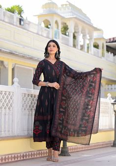 Grab this beautiful 3-piece set. The set comes with anarkali style printed kurta has v neck, 3/4th sleeves & calf length teamed with matching bottom and a white chanderi cotton dupatta to match. Color - Black Kurta Fabric-Viscose Pant Fabric-Viscose Dupatta Fabric- Chanderi Cotton Neck-V Neck Sleeves-3/4th Sleeves Work - Print Detailing Washing Instructions-Dry Clean Model Height - 5.5 wearing size small. DISCLAIMER - The color of the product may be differ due to screen settings of device. A misprint here and a color drop slip there is the beauty of printing which is not treated as a defect. Festive Straight Kurta Set With Printed Border, Navratri Sets With Printed Border And Straight Kurta, Traditional V-neck Sets With Printed Motifs, Eid Ankle-length Sets With Printed Motifs, Ankle-length Sets With Printed Motifs For Eid, Festive Block Print V-neck Set, Traditional V-neck Salwar Kameez With Printed Motifs, Traditional Ankle-length Sets With Printed Motifs, Festive Ankle-length Sets With Printed Motifs