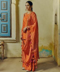 The rust printed, hand-embroidered kurta in dupion silk paired with printed flared pants and a tasseled dupatta sounds like a striking ensemble. The hand embroidery adds intricate detailing to the kurta, while the printed pants and dupatta complement the overall look with their coordinated design. Flared Sharara, Kurta And Palazzo, Clover Print, Kurta Sharara Set, Kurta Sharara, Printed Dupatta, Palazzo Set, Dupion Silk, Luxury Sale