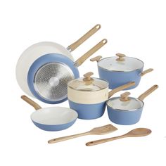 a set of blue pots and pans with wooden utensils