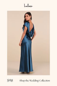 a woman in a long blue dress with the back open