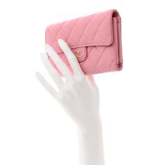 This is an authentic CHANEL Lambskin Quilted Medium Flap Wallet in Pink. This stylish wallet is crafted of luxurious diamond quilted lambskin leather in pink with a small light gold Chanel CC logo. The wallet opens to a pink leather interior with card slots, a billfold, and a zippered compartment. Gold Chanel, Diamond Quilt, Small Light, Cc Logo, Pink Leather, Leather Interior, Lambskin Leather, Card Slots, Slots