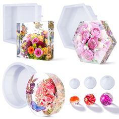 flowers and butterflies are arranged in the shape of hexagonal boxes with matching lids