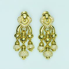 Chandelier Gold Diamond Earrings. Impressive chandelier 18K gold diamond earrings. The striking elegance of these chandelier earrings is exceptionally stunning. Measurements: Length: 2.5" Width: 1.1"Weight: 71.8 Grams Luxury Vintage Gold-tone Earrings, Exquisite Diamond Chandelier Earrings In Gold, Luxury Gold Diamond Chandelier Earrings, Gold Chandelier Earrings With 17 Diamonds, Impressive Chandelier, Chandelier Gold, Yellow Gold Diamond Earrings, Genuine Love, Gold Chandelier